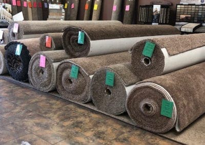 Carpet rolls stacked in the showroom