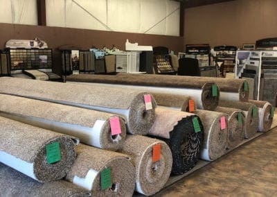 A bunch of carpet rolls